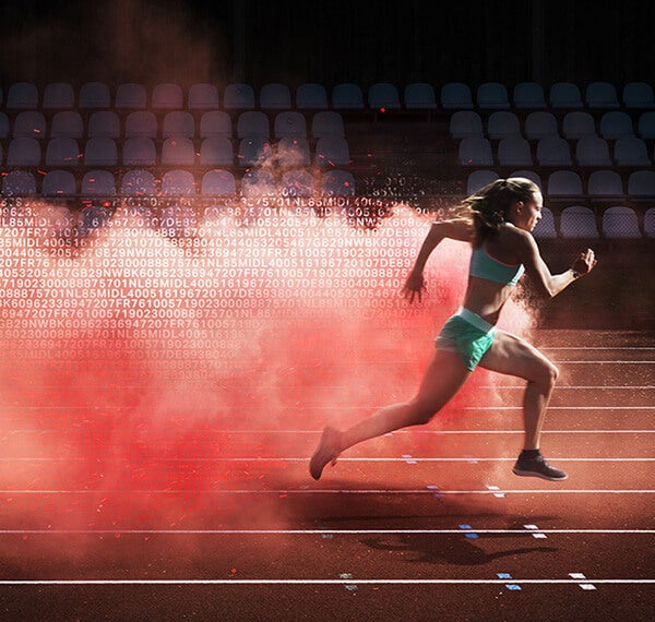 Female runner going through dust cloud of data